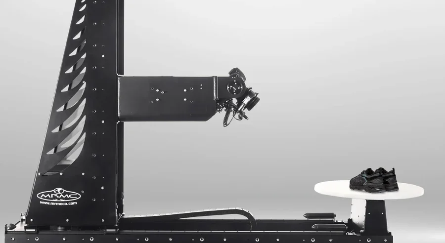 MRMC's Orbital system, the same class of turntable-and-arm rig, photographing a shoe